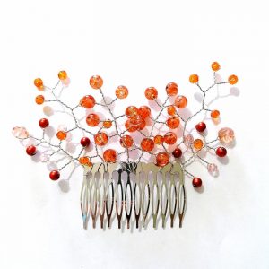 Pieptene argintiu cu ornamente in nuante caramizii