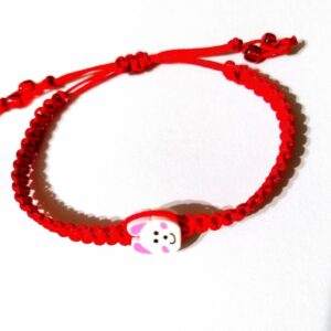 Bratara rosie impletita cu pisicuta alba