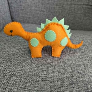 Jucărie dinozaur portocaliu